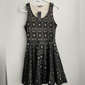 Tinley Road Black lace open back dress size M